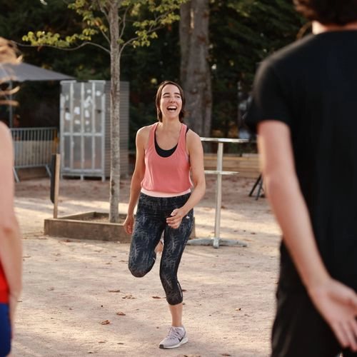 Participante souriante pendant une activité sportive du Challenge Alice Milliat